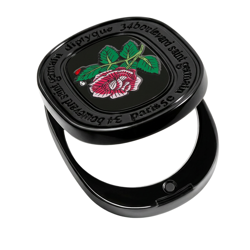 Black lacquered solid perfume compact with a rose motif
